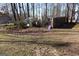 View of backyard with wooded area and fence at 125 Oak Leaf Dr, Stockbridge, GA 30281
