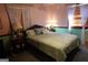 Bedroom with queen-sized bed, pastel walls, and decor accents provides cozy retreat at 125 Oak Leaf Dr, Stockbridge, GA 30281