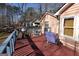 View of house from wood deck with chairs at 125 Oak Leaf Dr, Stockbridge, GA 30281