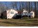Exterior of home featuring deck with stairs to backyard at 125 Oak Leaf Dr, Stockbridge, GA 30281