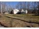 Charming home with a large backyard and deck, perfect for outdoor entertaining at 125 Oak Leaf Dr, Stockbridge, GA 30281
