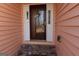 Front door with glass insert and white trim, leading into a home with neutral colors at 125 Oak Leaf Dr, Stockbridge, GA 30281
