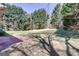 Secluded backyard featuring mature trees, a patio area, and ample space for outdoor enjoyment at 25 Brookstone Ct, Covington, GA 30016