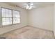 Bright bedroom with natural light, featuring a ceiling fan at 25 Brookstone Ct, Covington, GA 30016
