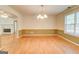 Dining room showcasing a chandelier and light-filled window at 25 Brookstone Ct, Covington, GA 30016