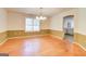 Bright dining room featuring a chandelier and natural light through the window at 25 Brookstone Ct, Covington, GA 30016