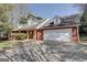 Lovely brick home with a large garage and dormer windows at 25 Brookstone Ct, Covington, GA 30016