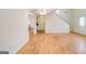 Spacious living room with hardwood floors and an open layout at 25 Brookstone Ct, Covington, GA 30016