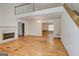 Spacious living room featuring a fireplace and an open floor plan at 25 Brookstone Ct, Covington, GA 30016