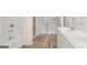 Bright bathroom features a tub, shower, and double sinks at 313 Sound Cir # 140, Stockbridge, GA 30281