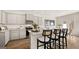 Stylish kitchen featuring granite countertops, stainless steel appliances, and modern cabinets at 313 Sound Cir # 140, Stockbridge, GA 30281