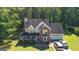 Two-story house with a large yard and driveway, seen from above at 245 Mckenzie Dr, Stockbridge, GA 30281