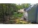 Spacious backyard with patio and wooded backdrop at 245 Mckenzie Dr, Stockbridge, GA 30281