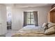 Spacious bedroom with large window and built-in wardrobe at 245 Mckenzie Dr, Stockbridge, GA 30281
