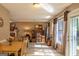 Dining area with wood table and access to back yard at 245 Mckenzie Dr, Stockbridge, GA 30281