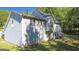 House with vinyl siding, attached garage and patio at 245 Mckenzie Dr, Stockbridge, GA 30281
