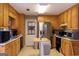 Kitchen boasts stainless steel appliances and ample cabinetry at 245 Mckenzie Dr, Stockbridge, GA 30281