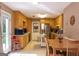 Kitchen with light wood cabinets, stainless steel appliances, and an island at 245 Mckenzie Dr, Stockbridge, GA 30281