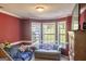 Living room with bay window and comfortable seating at 245 Mckenzie Dr, Stockbridge, GA 30281
