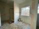 Under construction bathroom with shower and window at 4601 Parkwood Rd, Social Circle, GA 30025