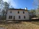 Rear view of house with patio and garden space at 885 Laney Rd, Locust Grove, GA 30248