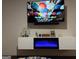 Modern entertainment center with electric fireplace and large TV at 898 Sw Oak Sw St # 3402, Atlanta, GA 30310