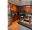 Modern kitchen with wood cabinets and granite counters at 898 Sw Oak Sw St # 3402, Atlanta, GA 30310