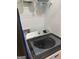 Modern laundry room with Maytag washer and storage at 898 Sw Oak Sw St # 3402, Atlanta, GA 30310