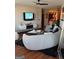Open living room with sectional sofa and view into kitchen at 898 Sw Oak Sw St # 3402, Atlanta, GA 30310