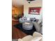 Spacious living room with large sectional sofa and hardwood floors at 898 Sw Oak Sw St # 3402, Atlanta, GA 30310