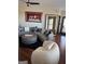 Living room featuring a curved sofa and hardwood floors at 898 Sw Oak Sw St # 3402, Atlanta, GA 30310