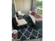 Relaxing patio with wicker furniture and patterned rug at 898 Sw Oak Sw St # 3402, Atlanta, GA 30310
