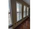 Bright room with four large windows and plantation shutters at 898 Sw Oak Sw St # 3402, Atlanta, GA 30310