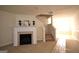 Living room with a fireplace and staircase leading upstairs at 1171 Dunaway Dr, Mcdonough, GA 30253