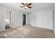 Spacious bedroom with double closets, light walls and carpeting at 339 Hiawassee Dr, Woodstock, GA 30188