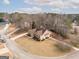 Two-story house aerial view, showing yard and driveway at 443 Abbey Pl, Villa Rica, GA 30180