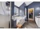 Bathroom with a walk-in shower, soaking tub and double vanity at 443 Abbey Pl, Villa Rica, GA 30180