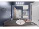 Bathroom with vanity sink and a large mirror at 443 Abbey Pl, Villa Rica, GA 30180