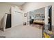 Bedroom with double doors leading to the Primary bathroom at 443 Abbey Pl, Villa Rica, GA 30180