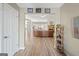 Bright entryway with hardwood floors offering a view of the living area at 443 Abbey Pl, Villa Rica, GA 30180
