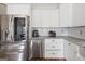 Stainless steel refrigerator and dishwasher in a kitchen at 443 Abbey Pl, Villa Rica, GA 30180