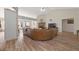 Open living room with a fireplace and hardwood floors at 443 Abbey Pl, Villa Rica, GA 30180
