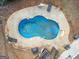 Freeform swimming pool in backyard at 443 Abbey Pl, Villa Rica, GA 30180