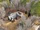 Home situated on wooded lot with private drive at 55 Rainey Ridge Dr, Oxford, GA 30054
