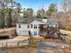 Two-story house with attached garage and deck at 55 Rainey Ridge Dr, Oxford, GA 30054