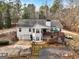 Two-story house with attached garage and deck at 55 Rainey Ridge Dr, Oxford, GA 30054