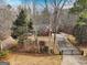 Aerial view of house with private gated entrance at 55 Rainey Ridge Dr, Oxford, GA 30054