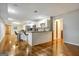 Modern basement kitchen with island, stainless steel appliances, and hardwood floors at 55 Rainey Ridge Dr, Oxford, GA 30054
