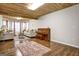 Bright basement features a living area with a piano at 55 Rainey Ridge Dr, Oxford, GA 30054