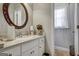 Elegant bathroom with white vanity and large mirror at 55 Rainey Ridge Dr, Oxford, GA 30054